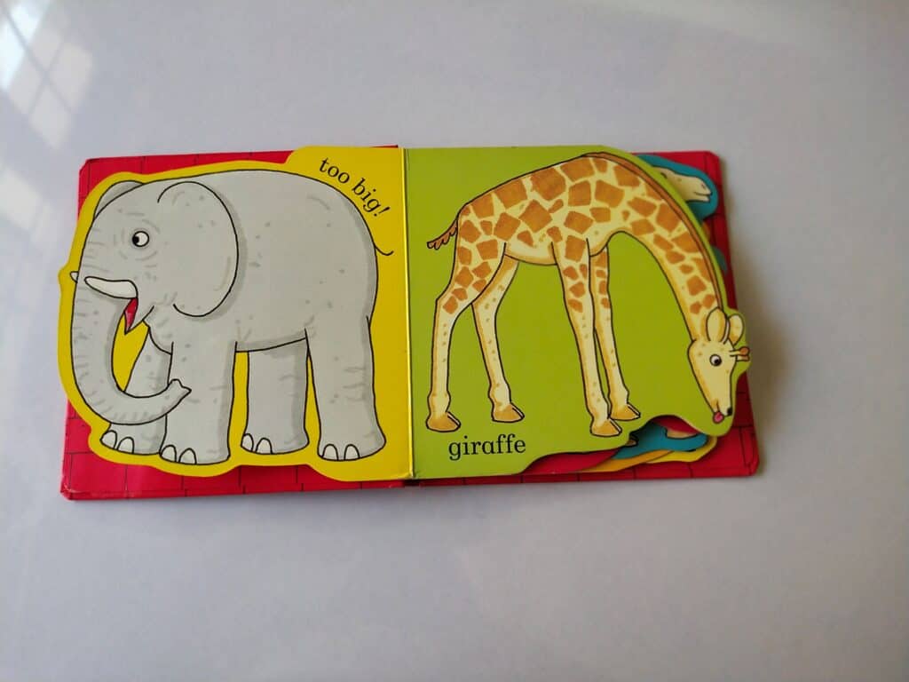 The page shows the cut of elephant's character and cut out of giraffe.